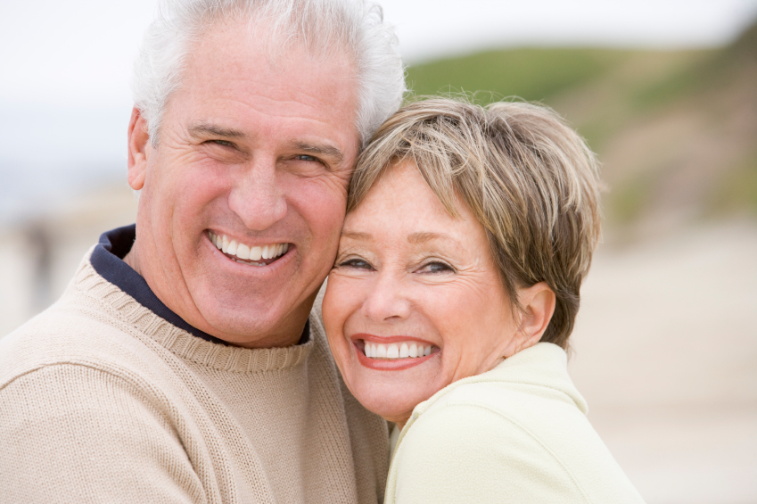 Smiling couple with dentures from Anchorage dentist serving Wasilla