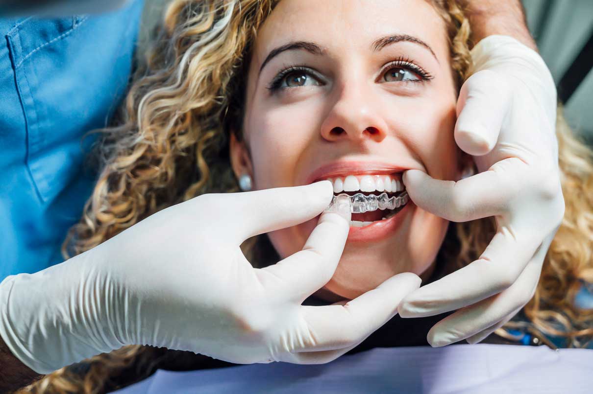 Patient being fitted for Invisalign Clear Braces in Anchorage